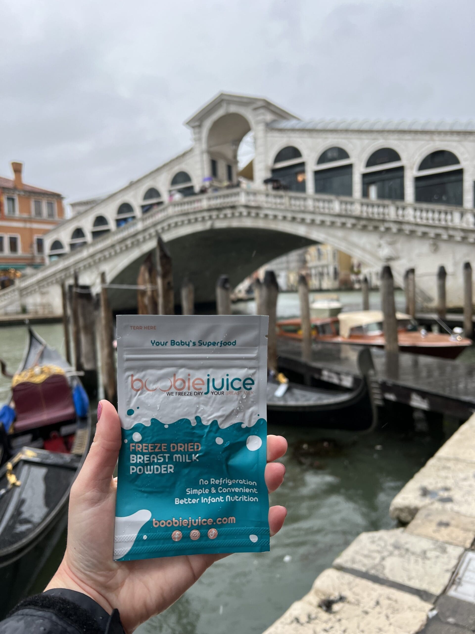 BoobieJuice freeze-dried breast milk pouches in a held up for a family vacation in Italy.